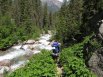 Suzy Hiking down along the beautiful Needleton Creek from Chicago Basin toward Needleton Trailhead, San Juan Mountains