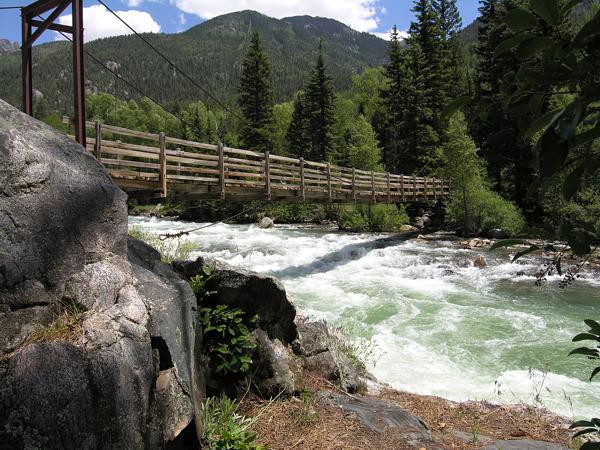 The Bridge cossing the Animas River, at the Needleton Trailhead in the San Juan Mountains, between Durango & Silverton, Colorado