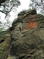 Mark Buman rap jumping the Big Banana Buttress
        Monkeyface Cliffs, NSW, Australia